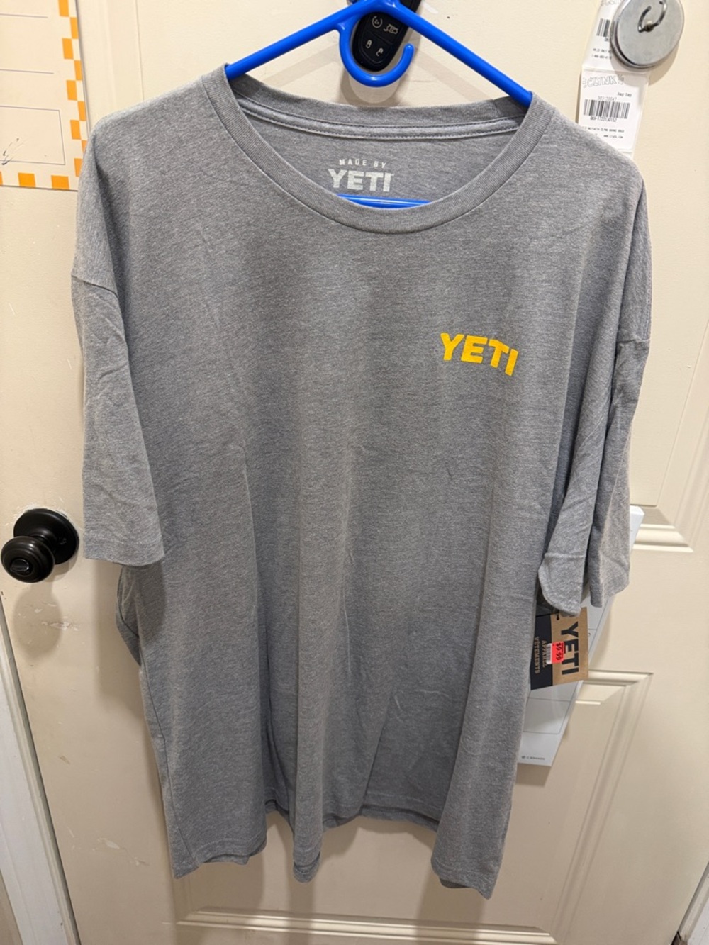 Yeti Men's Gray Short Sleeve Tee with Yellow Logo
